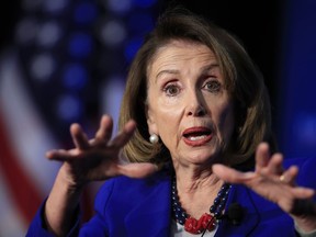 In this March 8, 2019, photo, House Speaker Nancy Pelosi of Calif., speaks at the Economic Club of Washington in Washington. Pelosi is setting a high bar for impeachment of President Donald Trump, saying he is "just not worth it" even as some on her left flank clamor to start proceedings