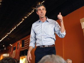 FILE - In this March 15, 2019, file photo, former Texas congressman Beto O'Rourke speaks during a stop at the Central Park Coffee Company in Mount Pleasant, Iowa. A former Iowa Democratic Party official is facing criticism for jumping from the party to work for O'Rourke _ and bringing with him inside information his opponents say could give him an advantage.