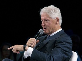 FILE - In this Sept. 26, 2018, file photo, former President Bill Clinton speaks at the Bloomberg Global Business Forum in New York.