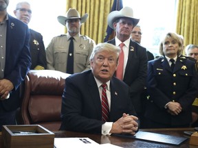 In this March 15, 2019, photo, President Donald Trump speaks about border security in the Oval Office of the White House, Friday, March 15, 2019, in Washington. Trump's veto of a bipartisan congressional resolution rejecting his border emergency declaration is more than a milestone. It signals a new era of tenser relations between the two ends of Pennsylvania Avenue.