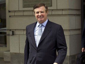 FILE - In this May 23, 2018, file photo, Paul Manafort, President Donald Trump's former campaign chairman, leaves the Federal District Court after a hearing in Washington. Manafort faces his second sentencing hearing in his many weeks, with a judge expected to tack on additional prison time beyond the roughly four-year punishment he has already received.