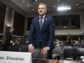 In this March 14, 2019, photo, acting Defense Secretary Patrick Shanahan goes before the Senate Armed Services Committee to discuss the Department of Defense budget, on Capitol Hill in Washington. To a remarkable degree, the Pentagon's new budget proposal is shaped by national security threats that Shanahan has summarized in three words: "China, China, China."