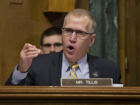 In this March 6, 2019, photo, Sen. Thom Tillis, R-N.C., questions U.S. Customs and Border Protection Commissioner Kevin McAleenan during a hearing of the Senate Judiciary Committee on oversight of Customs and Border Protection's response to the smuggling of persons at the southern border in Washington. Republicans from the White House to Congress to North Carolina are watching whether Tillis stands with Trump.