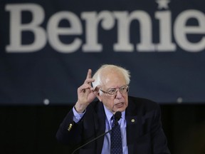 FILE - In this March 10, 2019, file photo, Democratic presidential candidate Sen. Bernie Sanders, I-Vt., addresses a rally during a campaign stop in Concord, N.H. "Medicare for All" legislation has two provisions that could make it even more politically divisive for 2020 Democratic presidential candidates: It lifts curbs on government health insurance for people in the country illegally and revokes longstanding restrictions on taxpayer-funded abortions. Embracing these will give Democratic candidates a boost with the party's liberal base in the primaries. But that could complicate things for an eventual nominee seeking support from voters in the middle