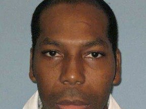 FILE - This undated file photo from the Alabama Department of Corrections shows inmate Dominique Ray. Texas death row inmate Patrick Murphy and Alabama death row inmate Dominique Ray both came to the Supreme Court recently with the same request. Halt my execution, each said, because the state won't let my spiritual adviser accompany me into the execution chamber, even as other inmates of different faiths get that ability. But while the Supreme Court declined to stop Ray's execution in February, they gave Murphy a temporary reprieve Thursday night. The difference in the two cases looks like it comes down to when each man asked for his spiritual adviser to be present. Alabama Department of Corrections via AP, File)