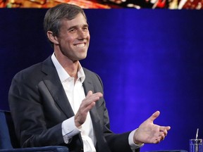 FILE - In this Feb. 5, 2019, photo, former Democratic Texas congressman Beto O'Rourke laughs as he is interviewed by Oprah Winfrey in New York.