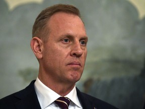 Acting Defense Secretary Patrick Shanahan listens during a proclamation signing with President Donald Trump and Israeli Prime Minister Benjamin Netanyahu in the Diplomatic Reception Room at the White House in Washington, Monday, March 25, 2019. Top defense leaders will face worried lawmakers on Capitol Hill for the first time since the Pentagon listed military construction projects that could lose funding this year to pay for President Donald Trump's border wall.