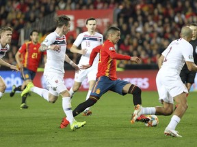Spain's Rodrigo, second from right, controls the ball during the Euro 2020 group F qualifying soccer match between Spain and Norway at the Mestalla stadium in Valencia, Spain, Saturday, March 23, 2019.
