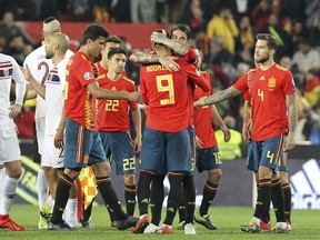 Spain's Sergio Ramos, third from right, celebrates with his teammate Rodrigo after winning the Euro 2020 group F qualifying soccer match between Spain and Norway at the Mestalla stadium in Valencia, Spain, Saturday, March 23, 2019.