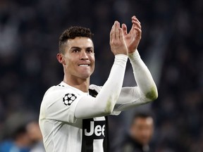 Juventus' Cristiano Ronaldo celebrates at the end of the Champions League round of 16, 2nd leg, soccer match between Juventus and Atletico Madrid at the Allianz stadium in Turin, Italy, Tuesday, March 12, 2019. Ronaldo scored the three goals in Juventus 3-0 win.