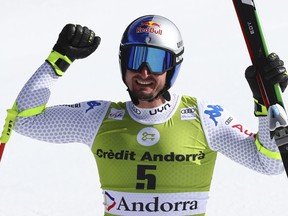 Italy's Dominik Paris reacts after competing in the men's downhill race at the alpine ski World Cup finals, in Soldeu, Andorra, Wednesday, March 13, 2019.