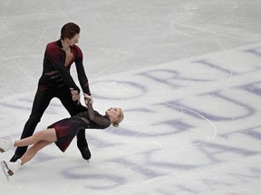 Russian Evgenia Tarasova and Vladimir Morozov perform during the pairs short program in the Japan World Figure Skating Championships at Saitama Super Arena in Saitama, north of Tokyo, Wednesday, March 20, 2019.