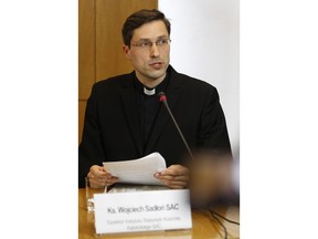 Wojciech Sadlon, head of Poland's Catholic Church Institute of Statistics, addresses the media during a news conference at the episcopate building in Warsaw, Poland, Thursday, March 14, 2019. Poland's Catholic Church leaders revealed Thursday they have recorded cases of 382 priests abusing minors since 1990.