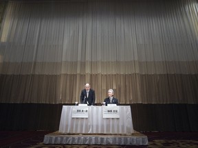 Co-chairs of the Special Committee for Improving Governance, Seiichiro Nishioka, left, and Sadayuki Sakakibara, right, attend a press conference in Yokohama, near Tokyo Wednesday, March 27, 2019. Nissan's committee, set up to strengthen corporate governance after the arrest of former Chairman Carlos Ghosn, is recommending the Japanese automaker add more independent outside directors on its board and better oversee compensation and auditing.