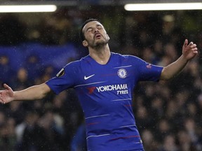 Chelsea's Pedro Rodriguez reacts after missing a shot during the Europa League round of 16, first leg soccer match between Chelsea and Dynamo Kyiv at Stamford Bridge stadium in London, Thursday, March 7, 2019.