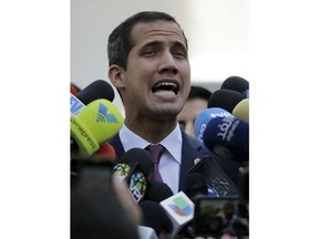 Venezuelan opposition leader Juan Guaido, who has declared himself interim president, speaks to the press after a meeting with coalition of opposition parties, and other civic groups in Caracas, Venezuela, Monday, March 18, 2019. After Guaido declared himself interim president in late Feb., Venezuelan President Nicolas Maduro has remained in power despite heavy pressure from the United States and other countries arrayed against him, managing to retain the loyalty of most of his military leaders.