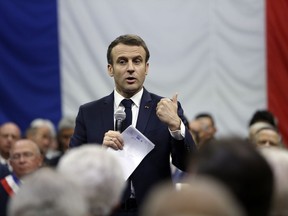 French President Emmanuel Macron attends a meeting as part of the "great national debate" on ecology matters in Greoux Les Bains, south of France, Thursday, March 7, 2019.