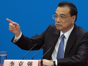 Chinese Premier Li Keqiang speaks during a press conference after the closing session of the National People's Congress in Beijing's Great Hall of the People on Friday, March 15, 2019.