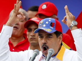 Venezuela's President Nicolas Maduro speaks during an anti-imperialist rally for peace, in Caracas, Venezuela, Saturday, March 23, 2019. The U.S. withdrew all embassy personnel from Caracas due to safety concerns after Maduro severed ties with the U.S. over its support for opposition leader Juan Guaido.