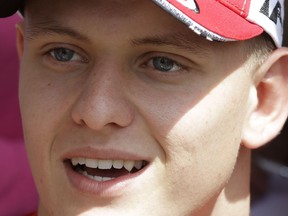 Formula 2 driver Mick Schumacher answers to reporters during a press conference at the Formula One Bahrain International Circuit in Sakhir, Bahrain, Thursday, March 28, 2019. It promises to be a whirlwind few days for the son of Formula One great Michael Schumacher, as he makes his F2 debut this weekend and then drives in his first F1 test for Ferrari on Tuesday.