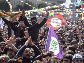 FILE-In this Sunday, March 24, 2019 file photo, some thousands of supporters of pro-Kurdish Peoples' Democratic Party, or HDP, gather to celebrate the Kurdish New Year and to attend a campaign rally in Istanbul, ahead of local elections scheduled for March 31, 2019.  Millions of Kurdish votes could be crucial in determining the outcome of the elections being held amid a heavy government crackdown on the HDP for alleged links to outlawed Kurdish militants.