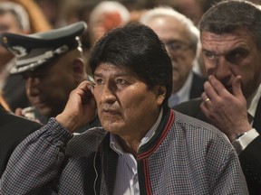 Bolivian President Evo Morales, listens to Greece's Prime Minister Alexis Tsipras, dueinf a press conference in Athens, Thursday, March 14, 2019. Morales is in Greece on a two-day official visit.