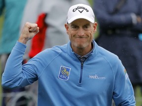 Jim Furyk pumps his fist after making a birdie on the ffifth hole during the final round of The Players Championship golf tournament Sunday, March 17, 2019, in Ponte Vedra Beach, Fla.