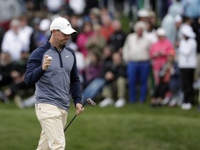 Rory McIlroy, of Northern Ireland, celebrates his birdie on the 16th hole during the final round of The Players Championship golf tournament Sunday, March 17, 2019, in Ponte Vedra Beach, Fla.