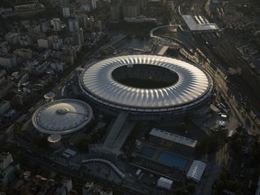 FILE - This June 8, 2014 file photo, shows an aerial view of the Maracana stadium, in Rio de Janeiro, Brazil. Rio de Janeiro's state government announced on Monday, March 18, 2019 that it will take back the control of the crisis-ridden Maracana stadium and break the contract with its private administrators.