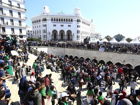 High school students march in Algiers, Algeria, Tuesday, March 12, 2019. Algerian students protested against President Abdelaziz Bouteflika's decision to delay presidential elections indefinitely.