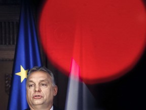 FILE- In this Monday, March 26, 2018 file picture, Hungary's Prime Minister Viktor Orban speaks during a ceremony marking the opening of a renovated synagogue in Subotica, Serbia. As the Hungarian prime minister's conflicts with the European Union appear headed to a breaking point, calls are increasing for greater scrutiny of his government's spending of EU funds. An opposition lawmaker in Hungary has gathered over 470,000 signatures to pressure Prime Minister Viktor Orban into joining the budding European Public Prosecutor's Office as Orban's Fidesz party may be suspended or expelled next week from the main center-right group in the European Parliament, it was announced Thursday, March 14, 2019.