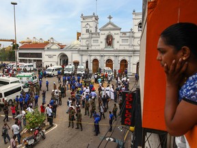 Sri Lankan security forces secure the area around St. Anthony's Shrine after an explosion hit St Anthony's Church in  Colombo.