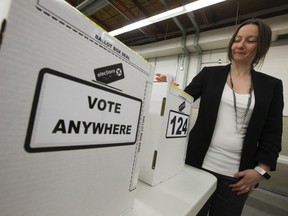 Elections Alberta Director of Operations and Communications Pamela Renwick demonstrates how advance polls in the provincial general election will be used, during a press conference in Edmonton Tuesday March 26, 2019.