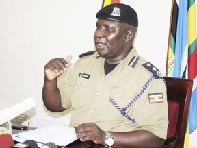 Police Spokesman Fred Enanga addressing a news Conference at the Police headquarters Monday, April 8, 2019, braking silence on the abduction of American tourist Kim Endicott and Ugandan tour guide Jean Paul Mirenge.   Kim Endicott and her Ugandan driver are both safe, after the five-day ordeal during which they were taken from Queen Elizabeth National Park across the border into Congo, according to Ugandan authorities.