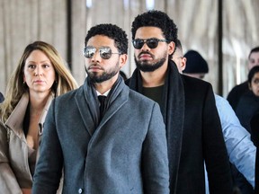 Actor Jussie Smollett and team arrive for a court hearing at the Leighton Criminal Courthouse in Chicago on March 12, 2019.