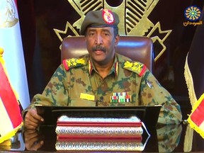 Lieutenant General Abdel Fattah al-Burhan Abdulrahman, the new chief of Sudan's ruling military council, appears on TV in the capital Khartoum.