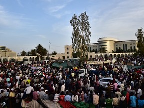 Sudanese demonstrators gather near the military headquarters in the capital Khartoum.