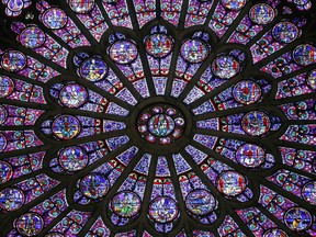 This file photo taken on November 29, 2012 shows the  stained glass rosace on the northern side of the Notre-Dame de Paris cathedral.