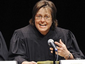 This Jan. 12, 2012 photo shows U.S. District Court Judge Sharon Gleason at a conference in Anchorage, Alaska. The Trump administration has suffered a pair of setbacks in attempting to reverse environmental policies set for Alaska by former President Barack Obama. Gleason on Friday, March 29, 2019 ruled that the Trump administration violated federal law with a proposed road through a national wildlife refuge. Hours later, Gleason ruled that Trump exceeded his authority by reversing a ban on offshore drilling in most of the Arctic Ocean and parts of the Atlantic