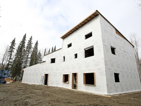 In this photo taken Wednesday, April 17, 2019, is a home under construction for the family of slain Fairbanks Police Department Sgt. Allen Brandt in North Pole, Alaska. A construction company donating time to help build the home, Johnson River Enterprises, on Wednesday discovered that more than $5,000 worth of tools had been stolen from a locked trailer at the site.