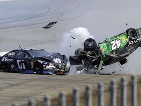 Kyle Larson (42) flips as he makes contact with  Jeffrey Earnhardt (81) on the back stretch during a NASCAR Cup Series auto race at Talladega Superspeedway, Sunday, April 28, 2019, in Talladega, Ala.
