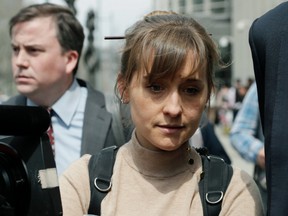 Actress Allison Mack leaves Brooklyn federal court Monday, April 8, 2019, in New York.