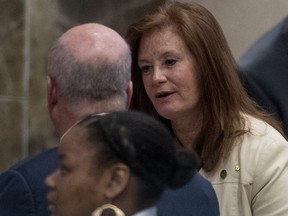 Rep. Terri Collins talks on the house floor at the Alabama Statehouse in Montgomery, Ala., on Tuesday April 30, 2019.  The House of Representatives on Tuesday will debate the proposal to make performing an abortion a felony. The bill contains an exemption for the mother's health but not for rape or incest. Collins is the sponsor of the abortion ban bill.