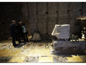 People walk in the Domus Transitoria, the first imperial palace of Roman Emperor Nero on the Palatine Hill in Rome, during its opening for the press, Thursday, April 11, 2019. Following the great fire of 64 AD, the palace was replaced by the Domus Aurea, Nero's Golden Palace.