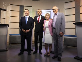 United Conservative Party leader Jason Kenney, left to right, Alberta Liberal Party leader David Khan, Alberta New Democrat Party leader and incumbent premier Rachel Notley and Alberta Party leader Stephen Mandel pose before the start of the 2019 Alberta Leaders Debate in Edmonton on Thursday, April 4, 2019.