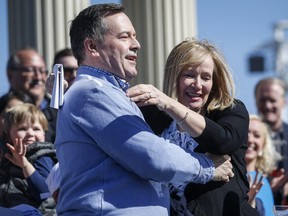 United Conservative Party leader Jason Kenney, left, hugs Laureen Harper, wife of former prime minister Stephen Harper, as he attends a rally as part of the UCP campaign platform roll out in Calgary, Alta., Saturday, March 30, 2019.