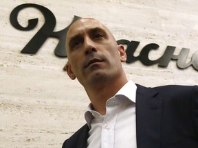 FILE  - In this Wednesday, June 13, 2018 file photo, Spanish football president Luis Rubiales leaves a press conference at the 2018 soccer World Cup in Krasnodar, Russia. The president of the Spanish federation says he is looking into the possibility of playing the Spanish Super Cup in Saudi Arabia beginning next year.