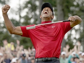 Tiger Woods reacts as he wins the Masters golf tournament Sunday, April 14, 2019, in Augusta, Ga.