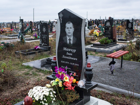 The headstone of Ivan Mamchur, a Ukrainian prison guard and military veteran who was murdered in Rivne, a city in western Ukraine.