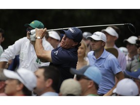 Phil Mickelson hits a drive on the ninth hole during the second round for the Masters golf tournament Friday, April 12, 2019, in Augusta, Ga.